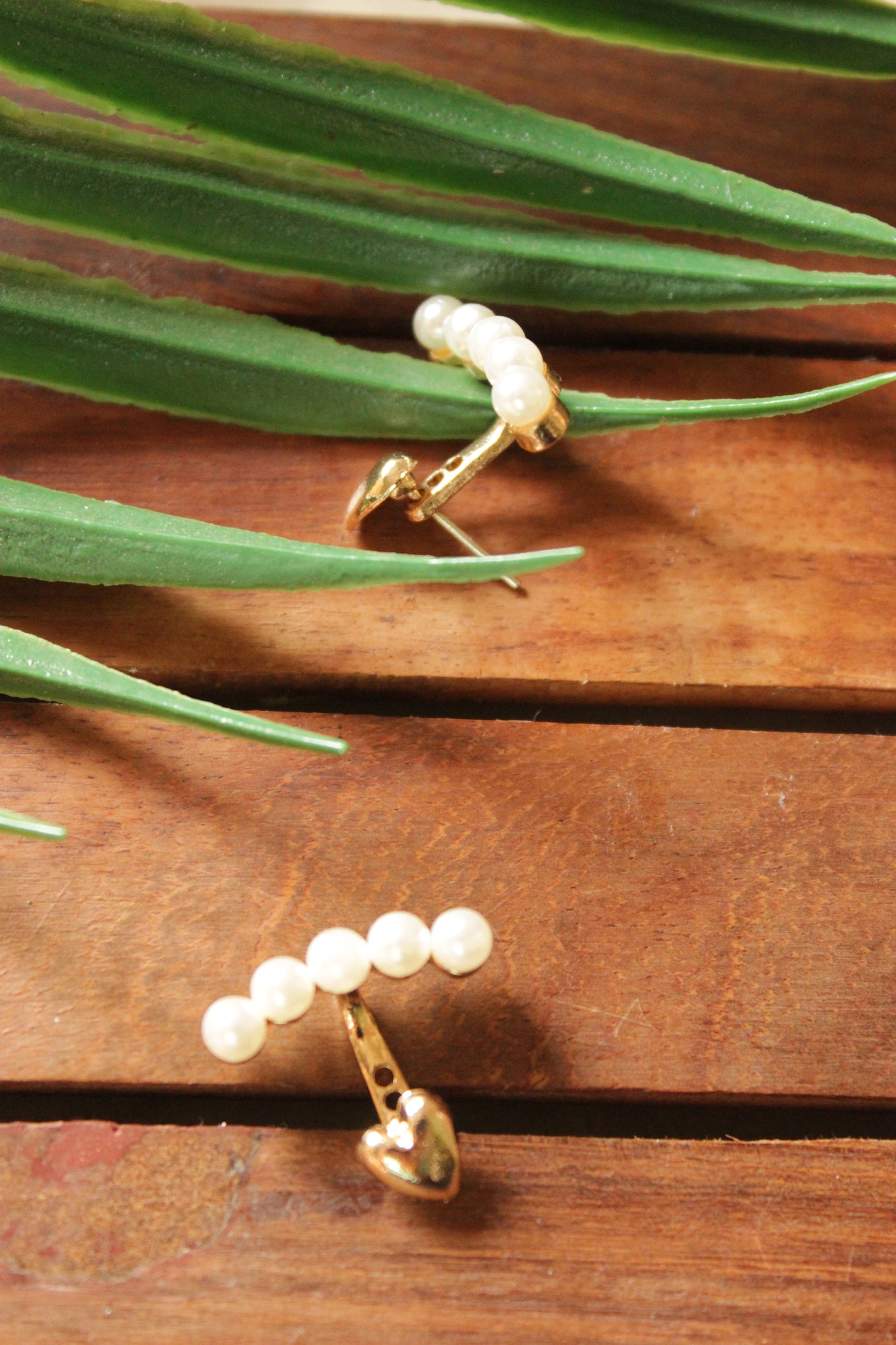 Gold Toned Heart Motif Pearls Stud Earrings