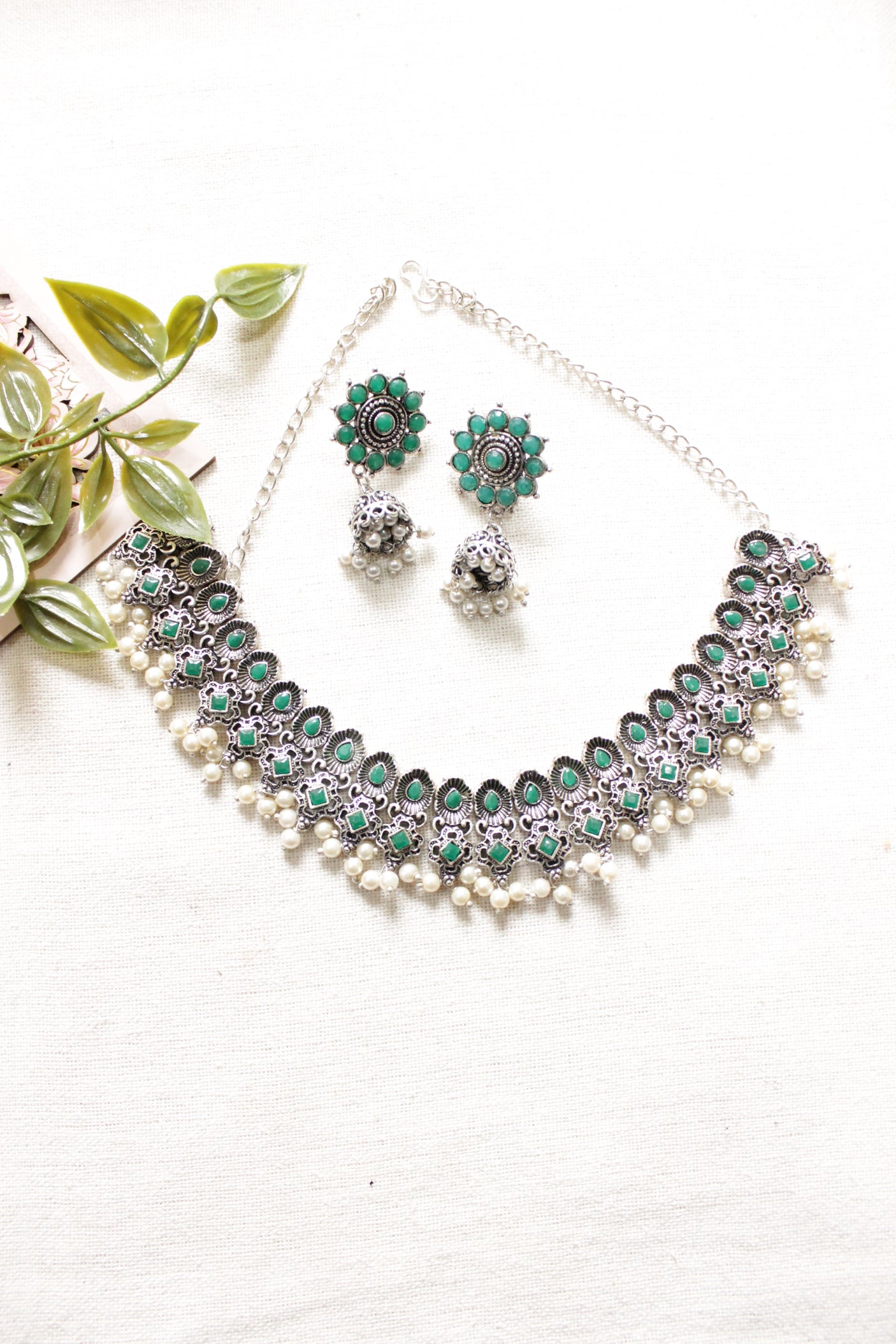 Green Glass Stones Embedded Silver Finish Choker Style Necklace Set with Jhumka Earrings