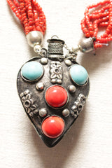 Multi-Layer Orange Hand Beaded Necklace with Oxidised Metal Tribal Pendant