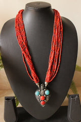 Multi-Layer Orange Hand Beaded Necklace with Oxidised Metal Tribal Pendant