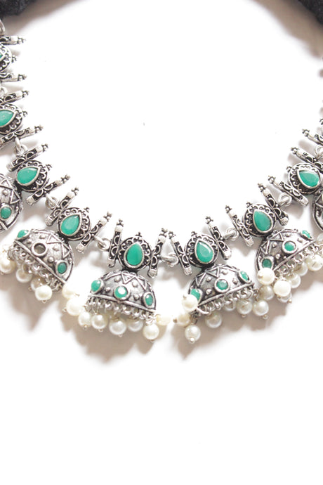Oxidised Finish Choker Necklace Set Embedded with Green Stones and Jhumka Earrings