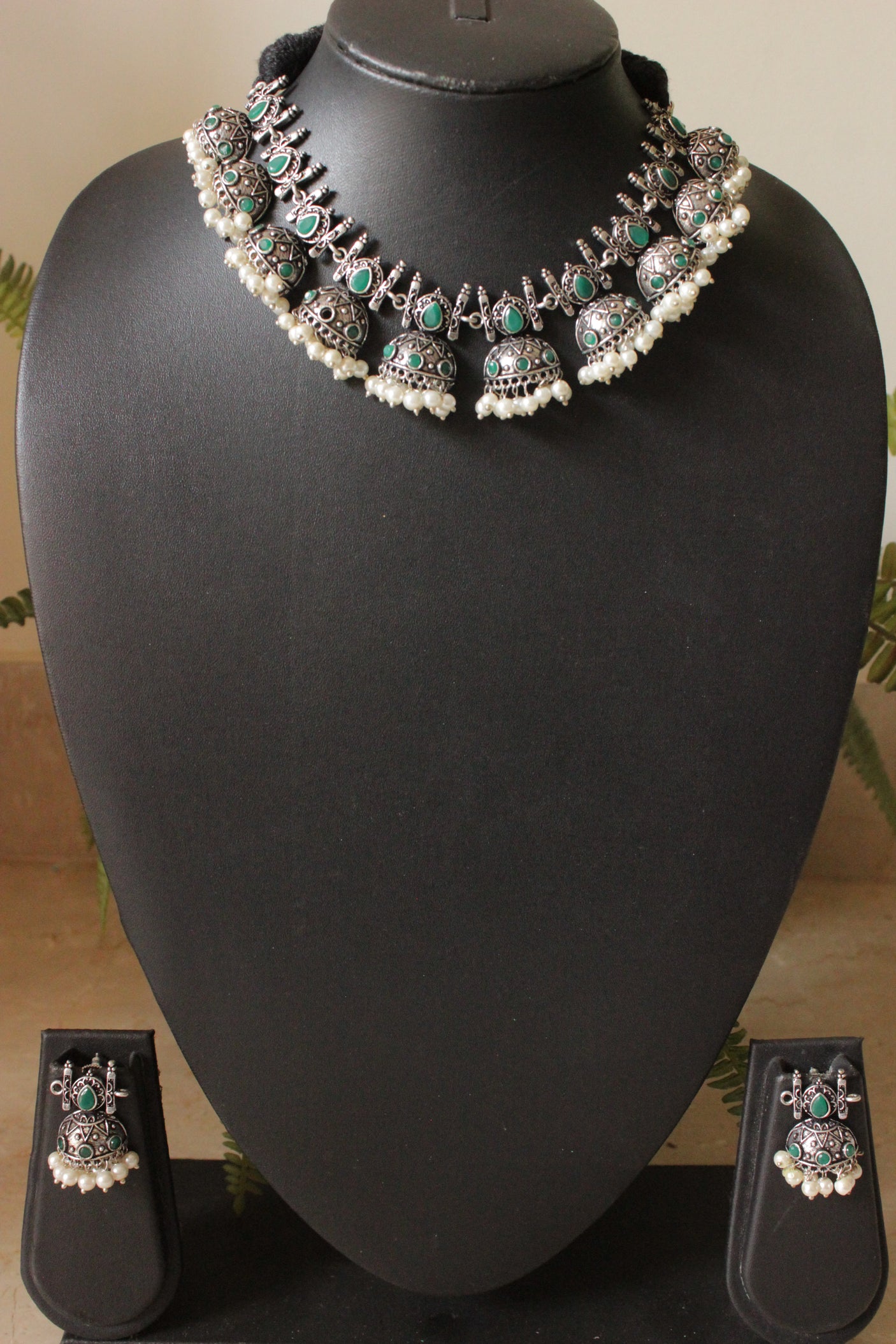 Oxidised Finish Choker Necklace Set Embedded with Green Stones and Jhumka Earrings