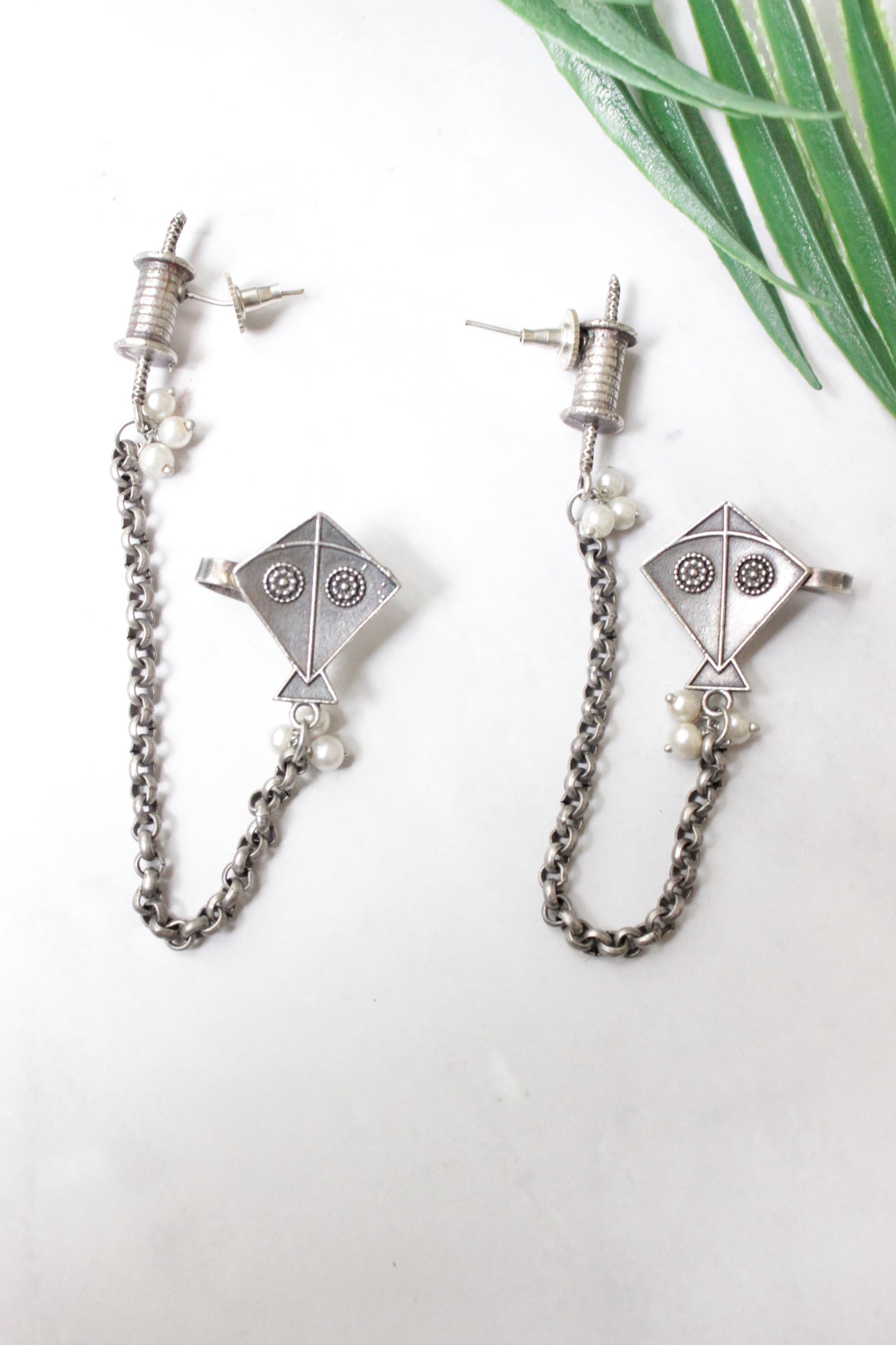 Silver Finish Kite Shape Bugadi Earrings