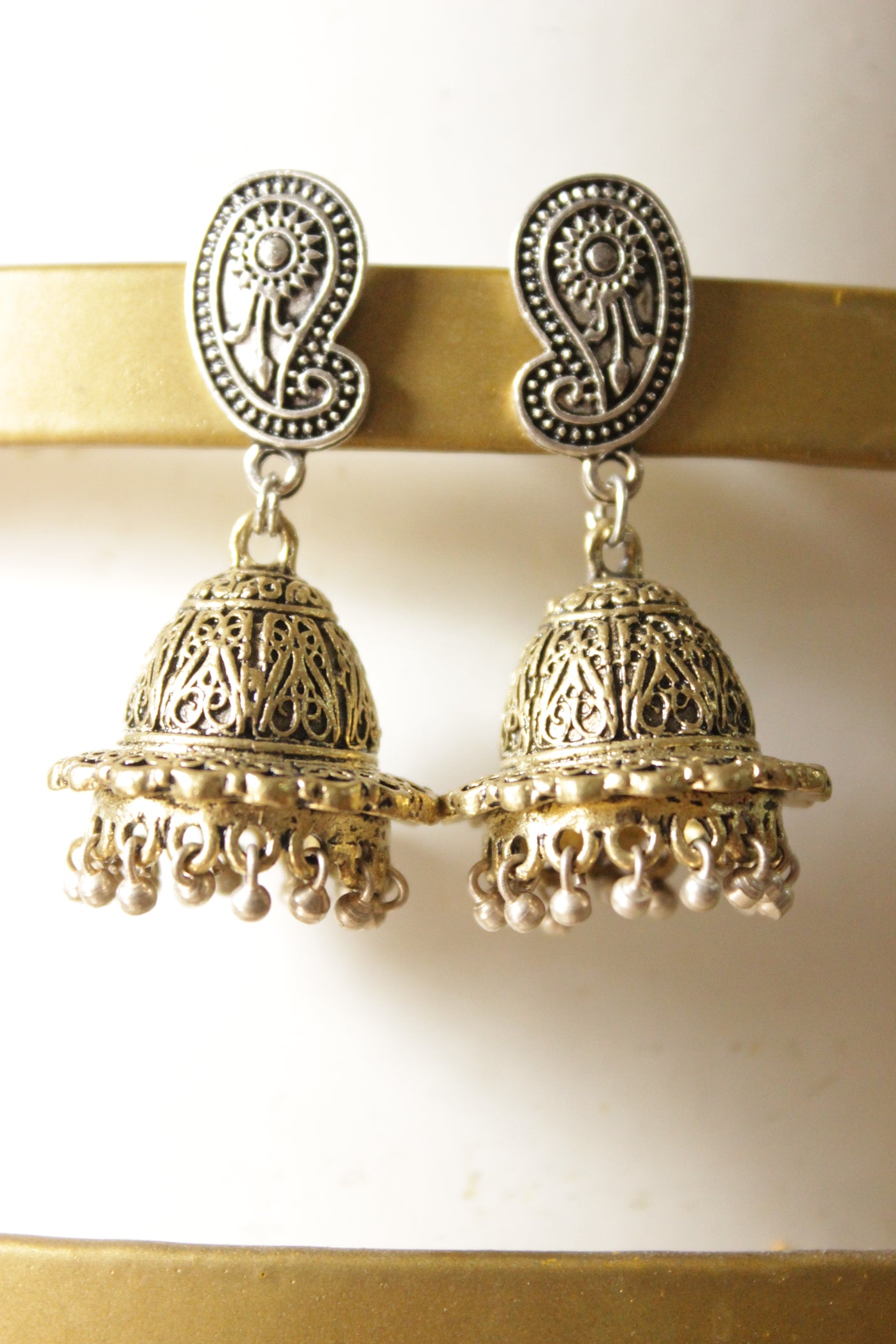 Intricately Detailed Oxidised Finish Dangler Jhumka Earrings