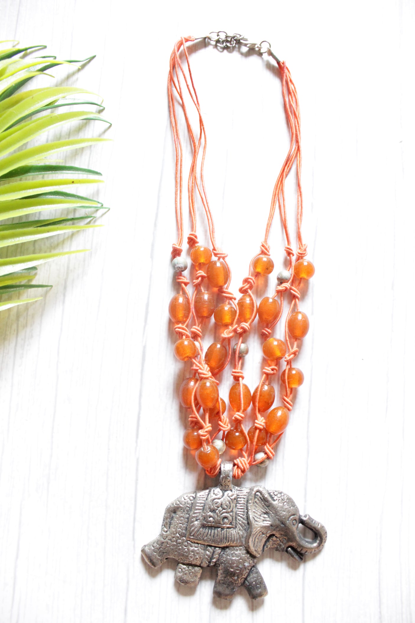 Orange Glass Beads Braided in Rope Threads with Statement Elephant Pendant Boho Necklace