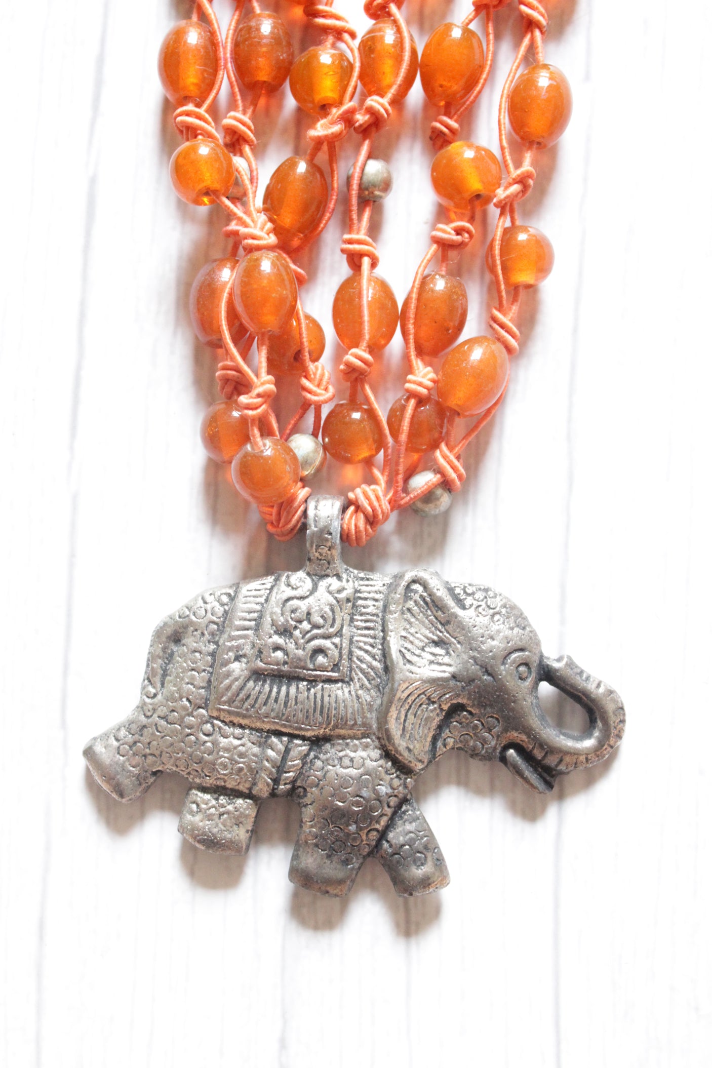 Orange Glass Beads Braided in Rope Threads with Statement Elephant Pendant Boho Necklace