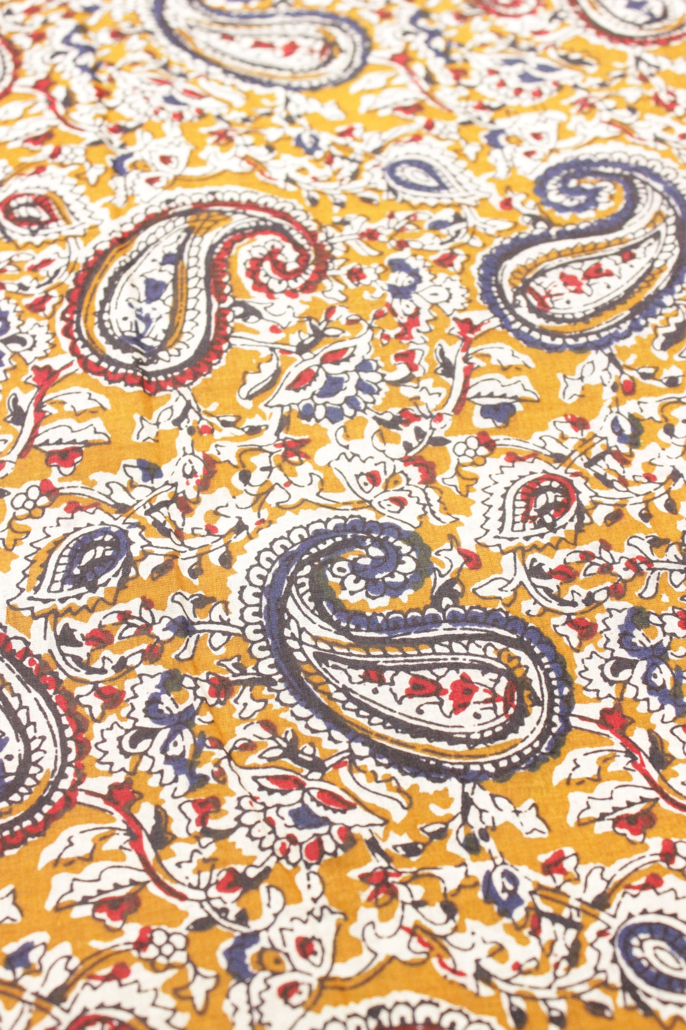 Yellowish Orange with Red and Purply Blue Kalamkari Pattern Digital Print Premium Cotton Fabric with Peacock Motifs