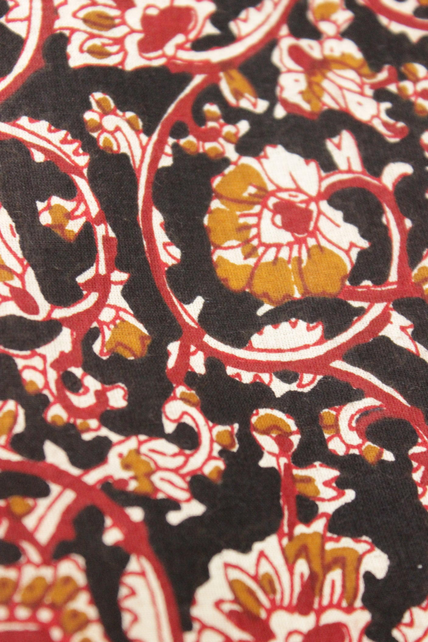 Dune Black with Mustard and Red Earthy Tones Kalamkari Pattern Digital Print Premium Cotton Fabric with Flower Motifs