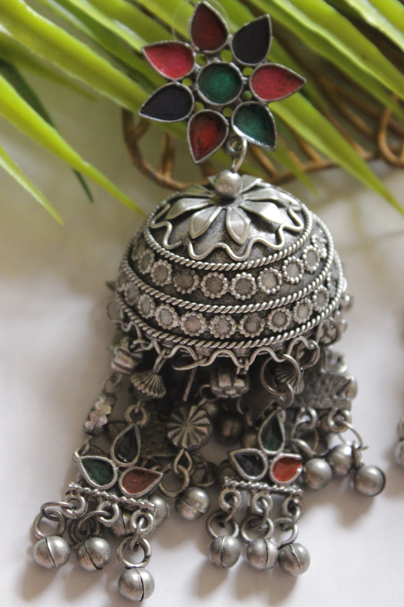 Oxidised Finish Red and Green Glass Stones Embedded Afghani Jhumka Earrings