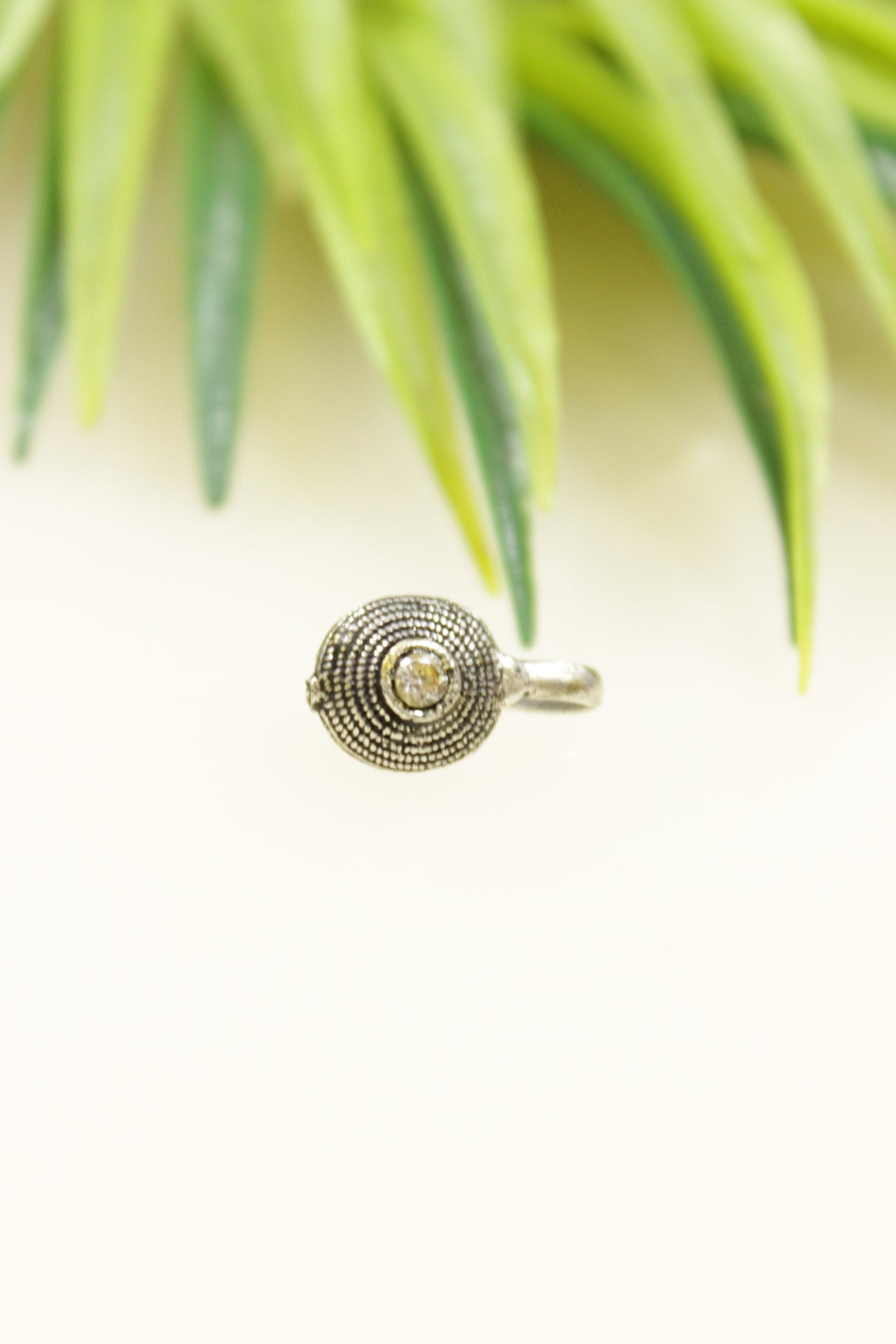 White Center Stone Embedded Oxidised Finish Spiral Clip On Nosepin