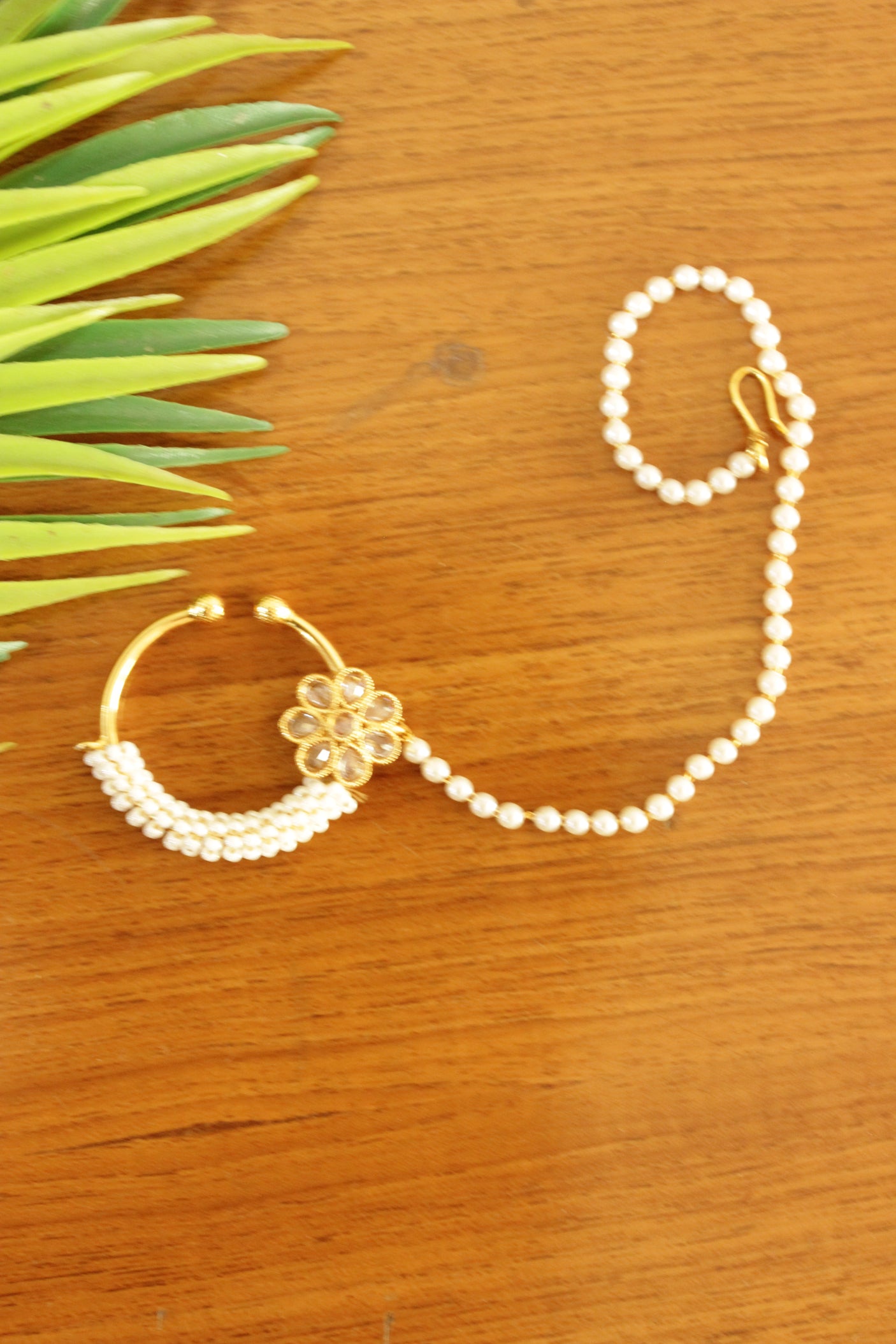 White Glass Stones and Pearl Embellished Gold Finish Clip On Nosepin/Nose Ring with Chain