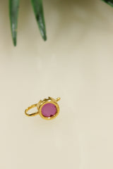 Circular Ruby Pink Glass Stone Embedded Gold Finish Clip On Nosepin