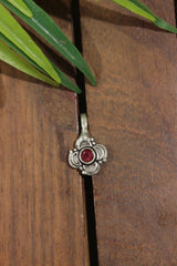 Red Center Stone Embedded Flower Shape Oxidised Finish Clip On Nosepin