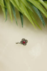 Red Center Stone Embedded Flower Shape Oxidised Finish Clip On Nosepin