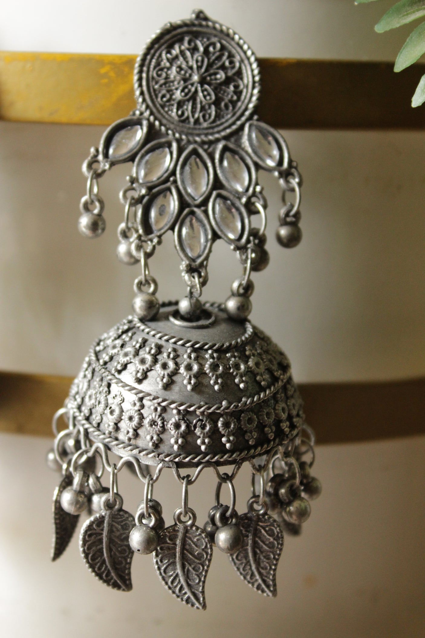 White Stones Embedded Premium Oxidised Finish Jhumka Earrings