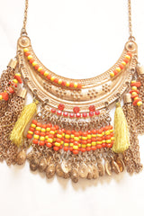 Dull Gold Finish Metal Accents and Chains Pom Pom Embellished Boho Necklace