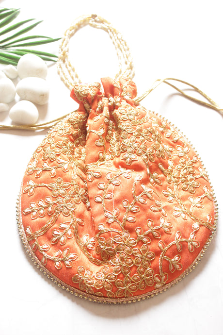 Orange Silk Fabric Hand Embroidered Gold Toned Potli