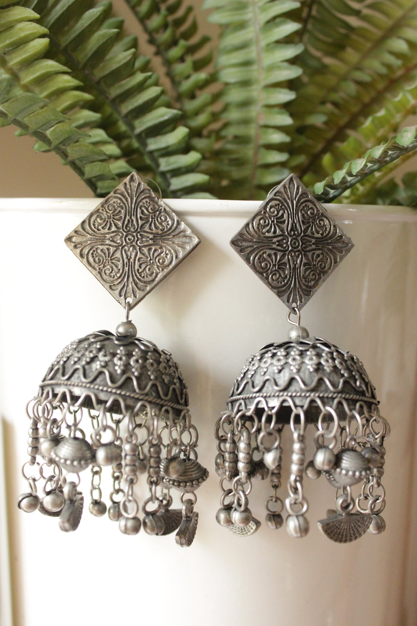 Oxidised Finish Metal Charm Strings Jhumka Earrings