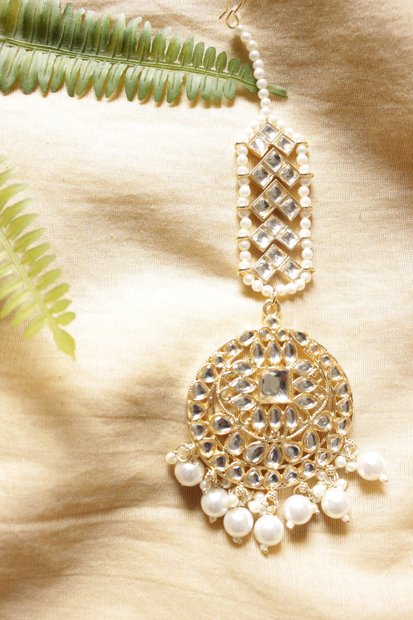 Kundan Stones Embedded Gold Toned Maang Tikka