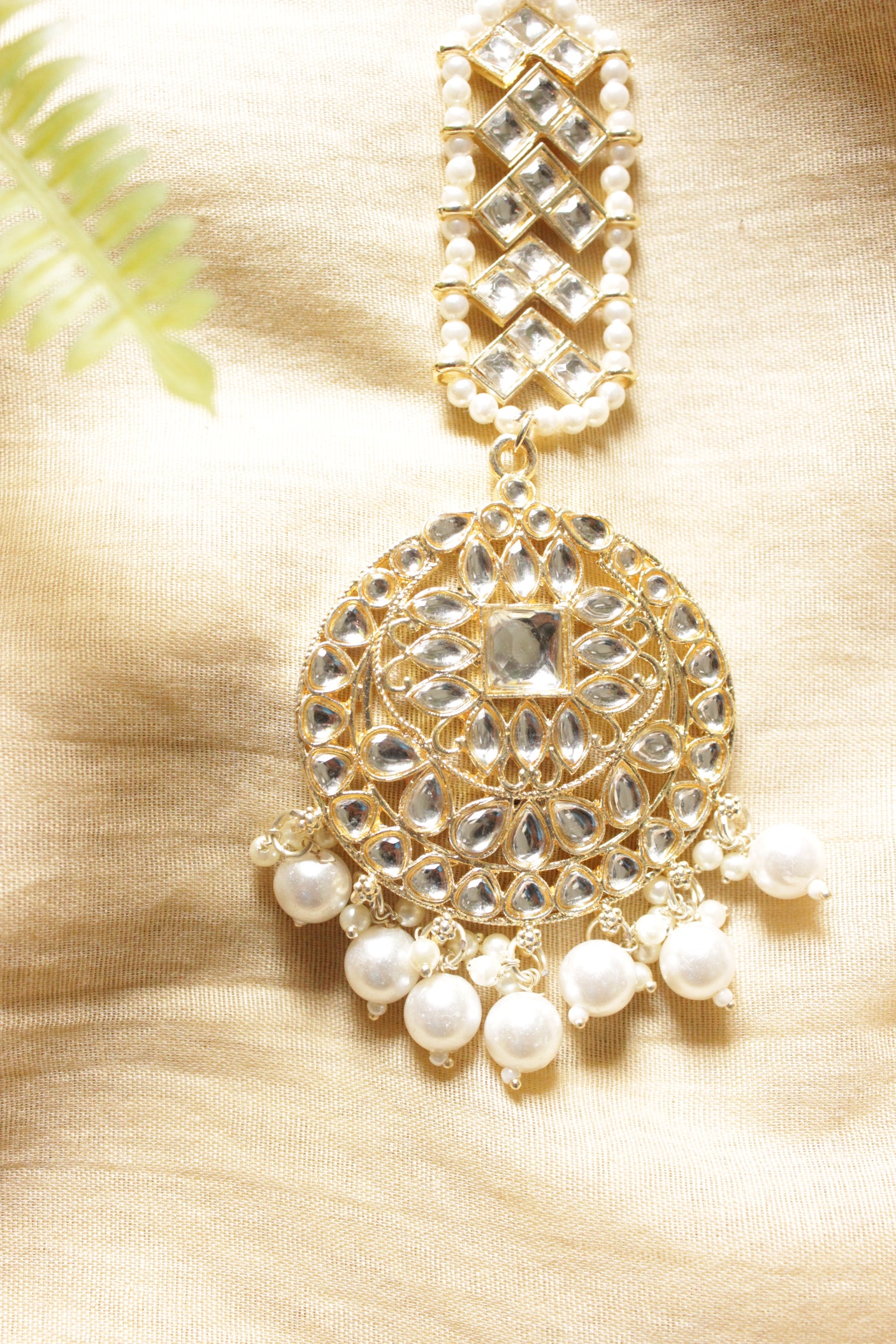 Kundan Stones Embedded Gold Toned Maang Tikka