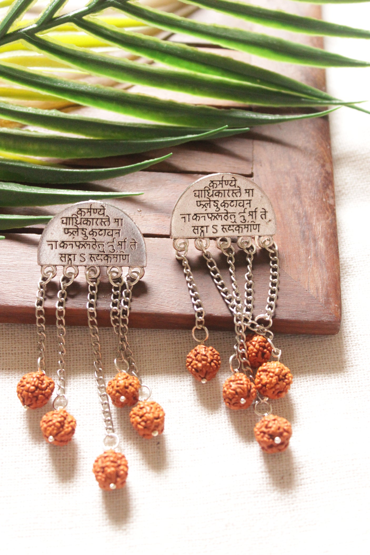 Mantra Printed Metal Earrings with Rudraksha Chain Strings