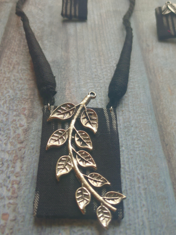 Black Ikat Printed Fabric Necklace Set with Metal Leaves Detailing