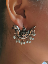 Intricately Crafted Peacock Earrings with White Beads