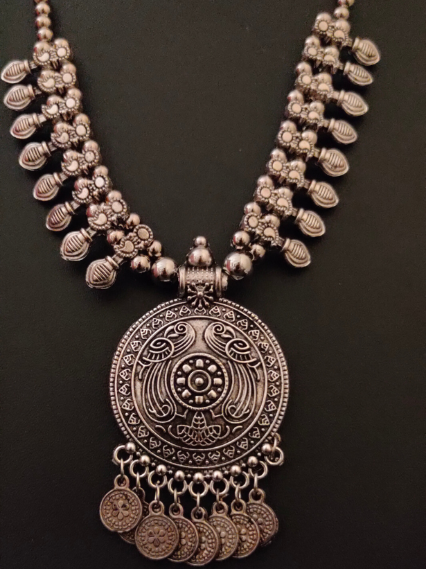 Intricately Crafted Metal Necklace with Coins and Peacock Detailing