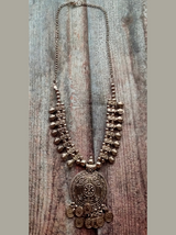 Intricately Crafted Metal Necklace with Coins and Peacock Detailing