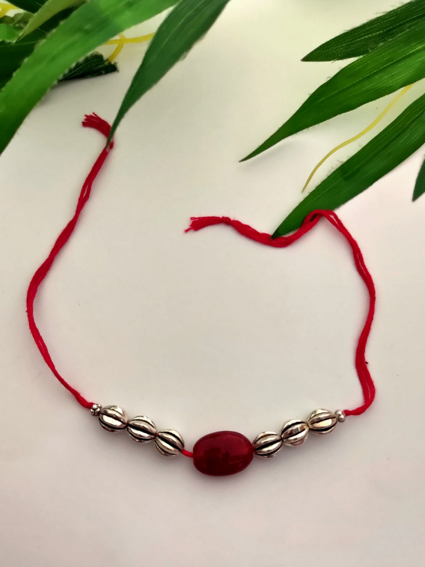 Acrylic and Metal Beads Rakhi with Red Cotton Thread
