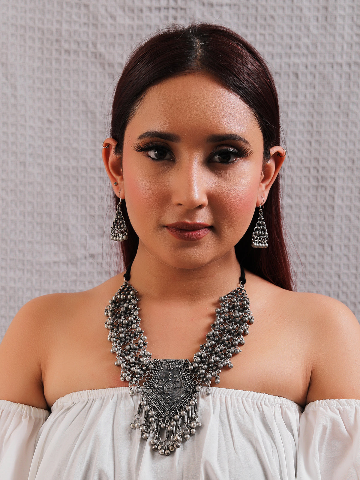 Ghungroo Embellished Oxidised Finish Elaborate Necklace with Adjustable Thread Closure