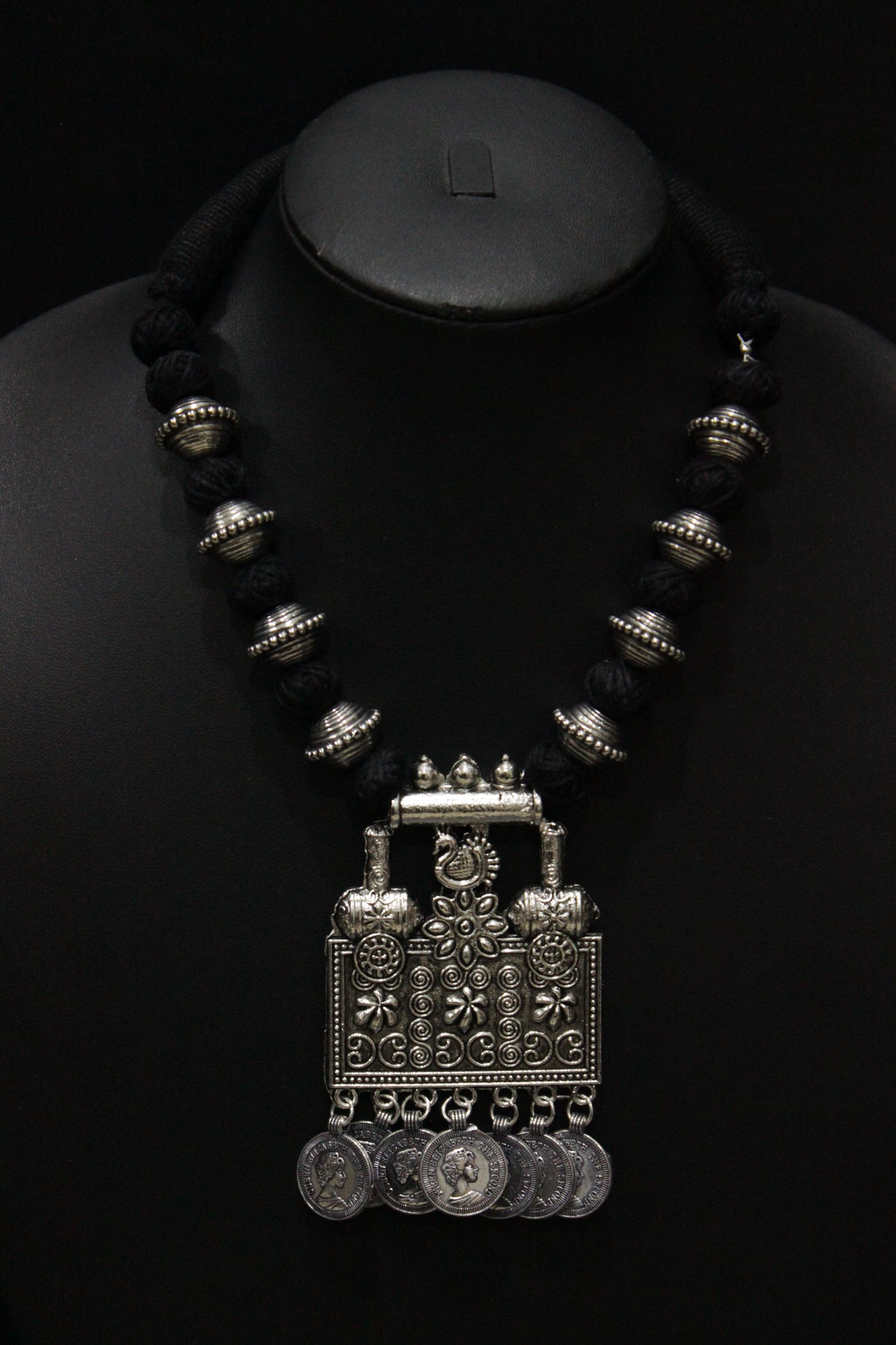 Intricately Detailed Statement Pendant Necklace with Stamped Coins and Thread Closure