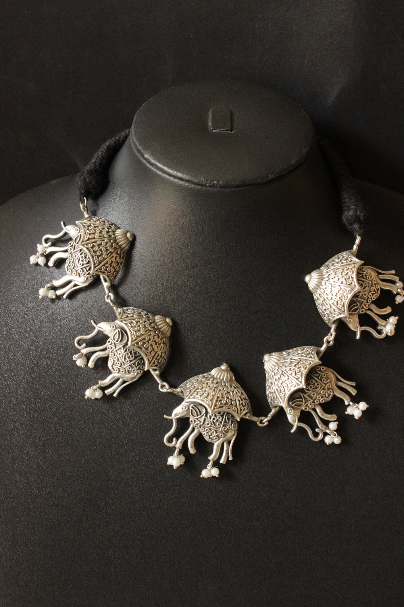 Artistically Detailed Elephant Motif Silver Finish Brass Choker Necklace Set with Adjustable Thread Closure